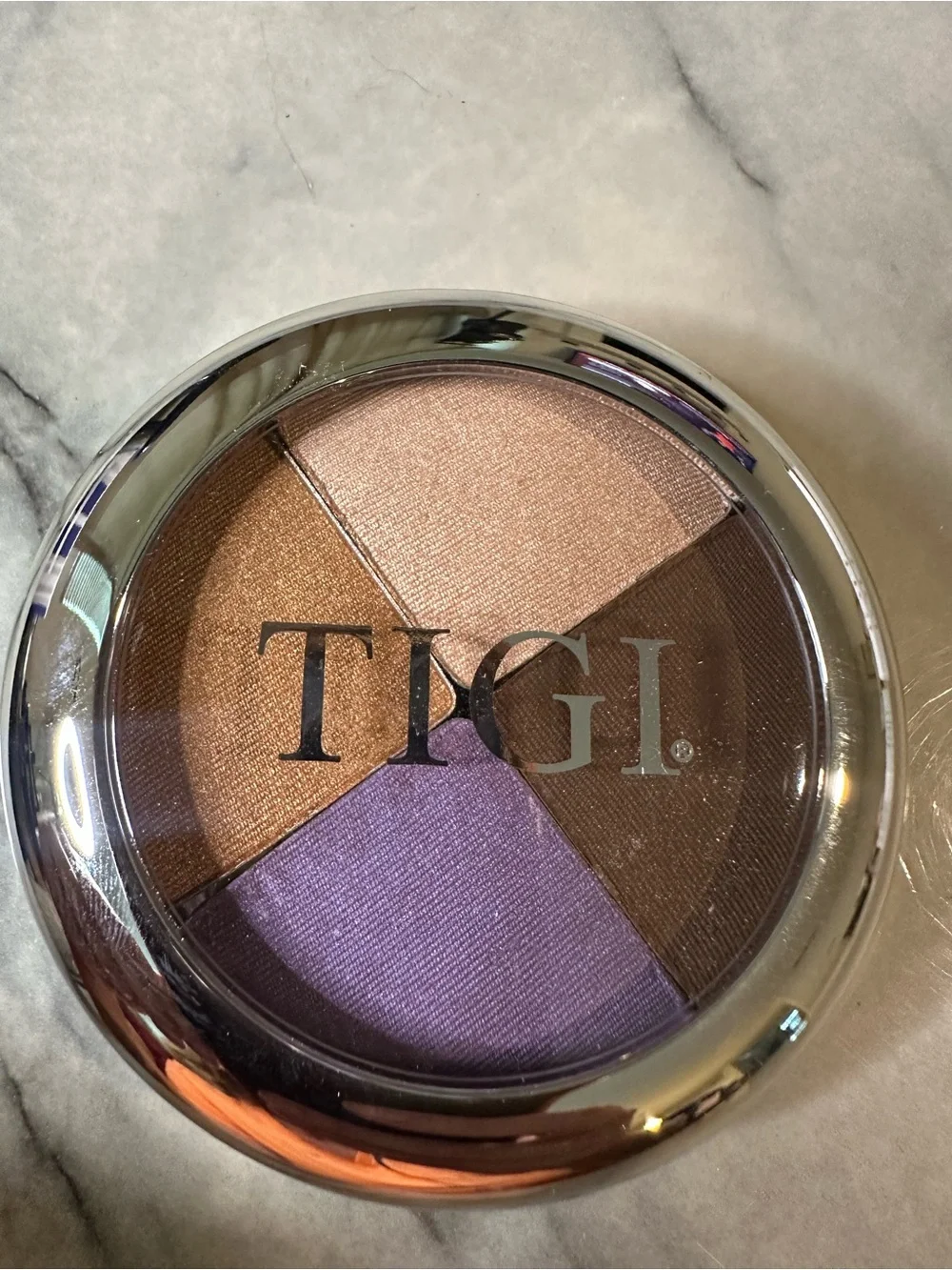 TIGI compact quad